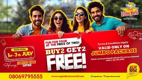 Group of friends holding a red banner promoting MGM Dizzee World’s Buy 2 Get 2 Free offer on Jumbo Package, valid from July 1st to 7th, 2025.