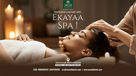 Ekayaa - The Spa at Swosti Premium poster featuring a woman reclining on a bed while another woman gives her a head massage.