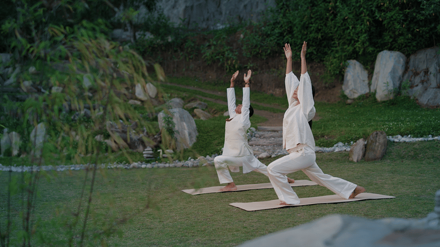 Yoga practice at Kavya Himalayas wellness resort in Nagarkot, Nepal, surrounded by a peaceful Himalayan setting.