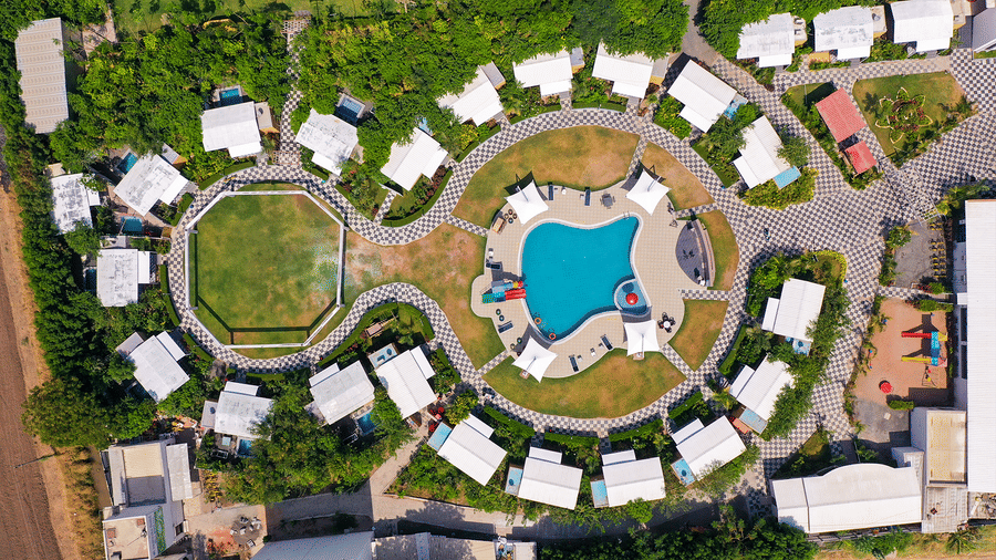Aerial view of circular layout with swimming pool at Lords SKD Resort, Salangpur.