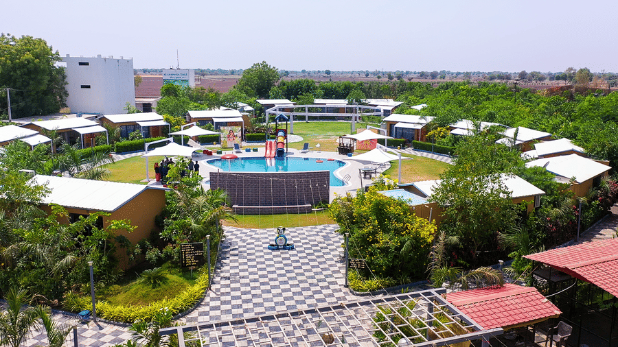 Wide aerial view of resort grounds and landscaped pathways at Lords SKD Resort, Salangpur.