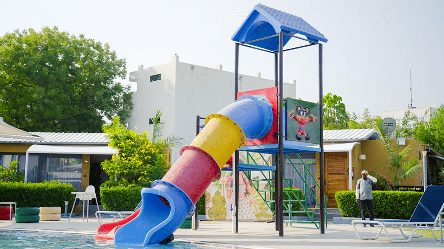 Kids play area with colorful slides at Lords SKD Resort, Salangpur.