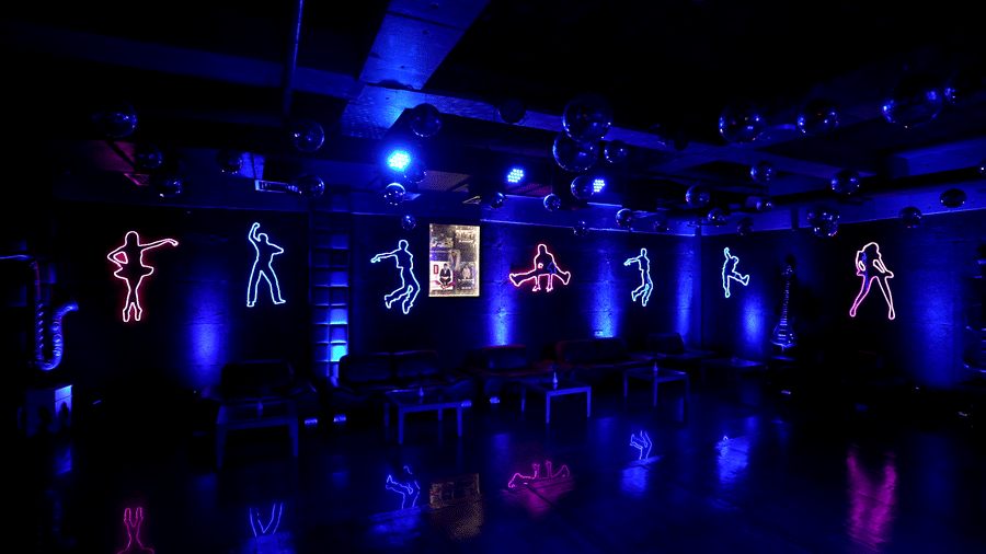 Vibrant nightclub with blue lighting and dance floor – Narayani Heights Hotel & Resorts