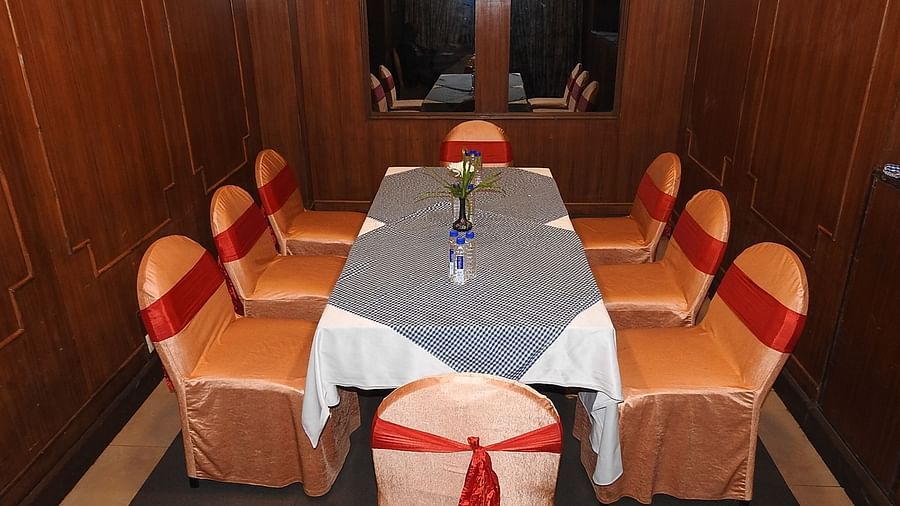 Top view of Royal Room with a long table and chairs arranged around it at Swosti Grand, Bhubaneswar