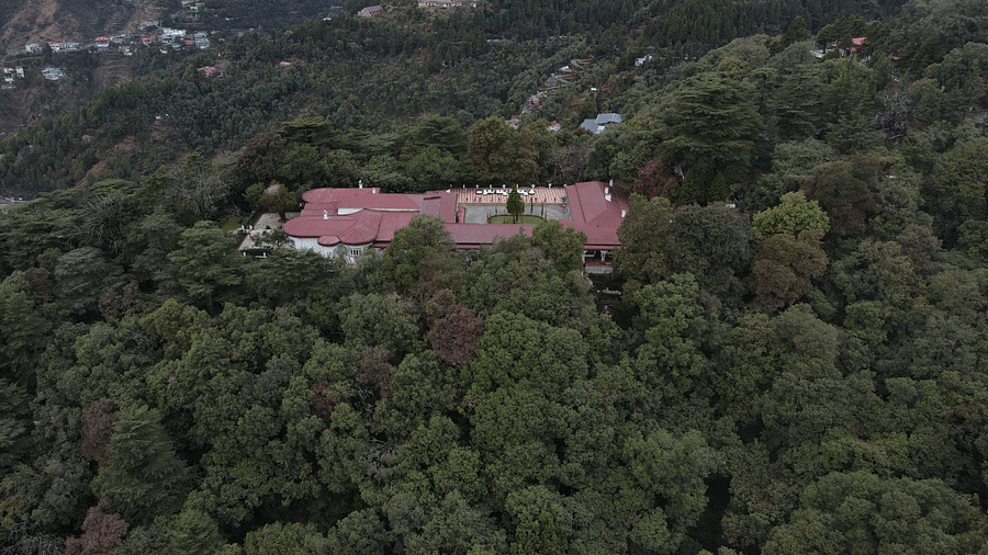 Aerial shot of The Claridges Nabha Residence in Mussoorie, surrounded by lush green forest