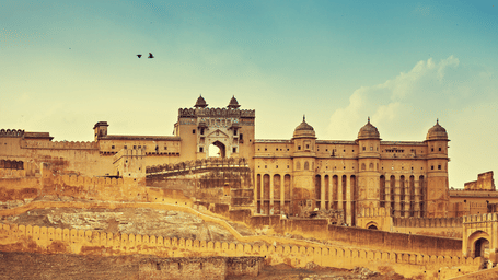 A wide shot of an ancient stone fortress or palace.