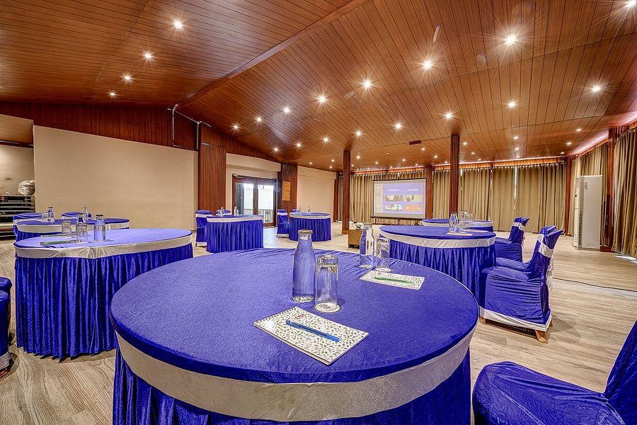 A spacious area with a round seating arrangement in the Conference Hall at Silver Sand Beach Resort, Havelock.
