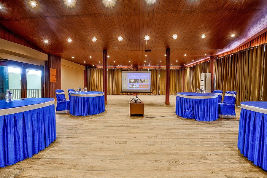 A spacious area with a round seating arrangement in the Conference Hall at Silver Sand Beach Resort, Havelock.