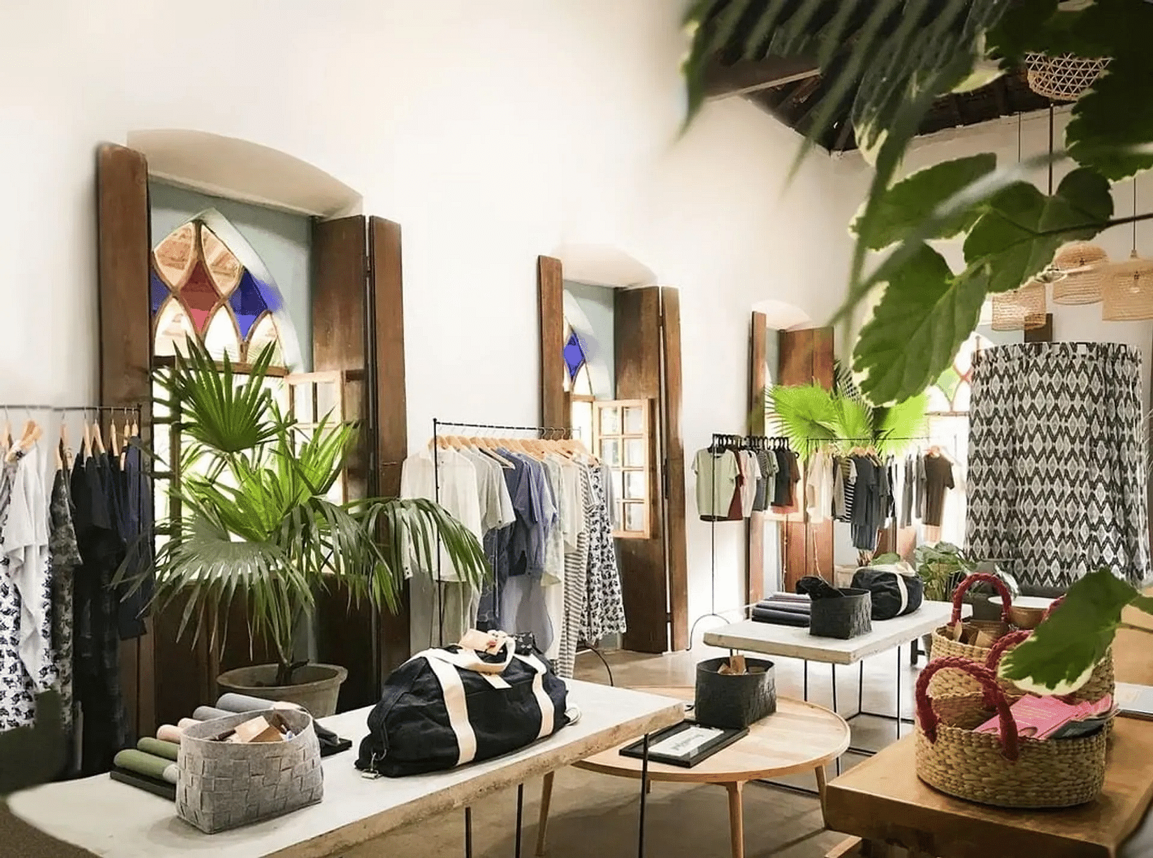Racks of clothes set in a room - Villa in Palms by V Escapes