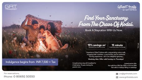 Promotional creative showing a family by a bonfire at Great Trails Kodaikanal by GRT Hotels for the weekday staycation offer.
