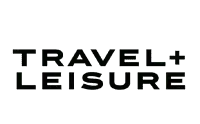 Travel plus Leisure logo in black capital letters on a light grey background.