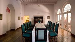 The Tower House - A conference setting in the grand hall of the Tower House with large entrance doors 2