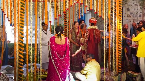 Hill Fort Kesroli 14th Century Alwar - Image of a couple taking part in a traditional Indian wedding ceremony