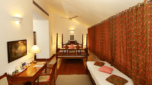 The Tower House - The Mossel room with a queen size bed and a single bed next to the workdesk