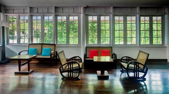 The Tower House - Kochin Caned Art Deco arm chairs built as a loungers