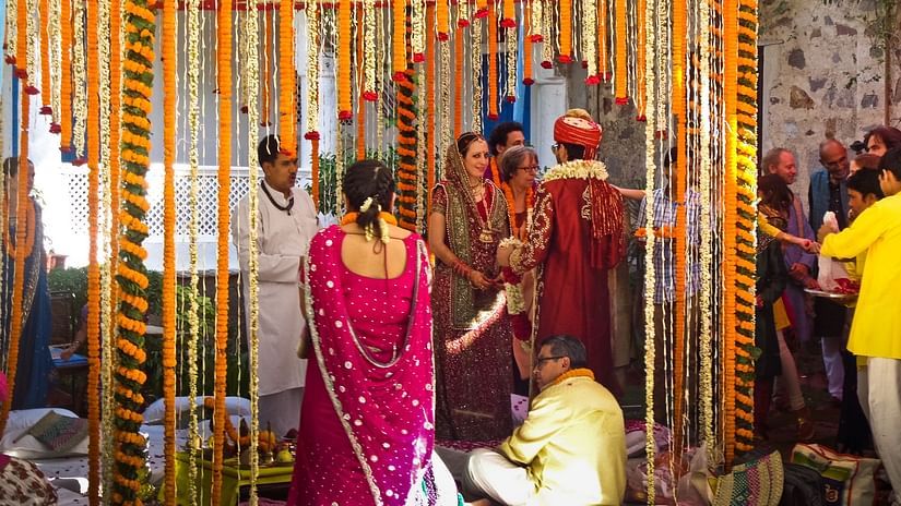 Hill Fort Kesroli 14th Century Alwar - Image of a couple taking part in a traditional Indian wedding ceremony