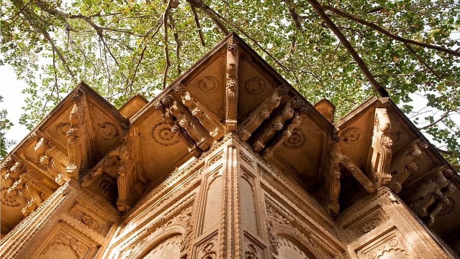 Deo Bagh - 17th Century, Gwalior - a shot from below of the brown exterior of a building