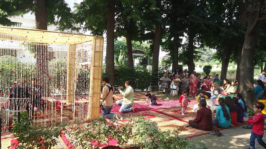 a decorated mantap with a photographer and other people looking on - The Baradari Palace