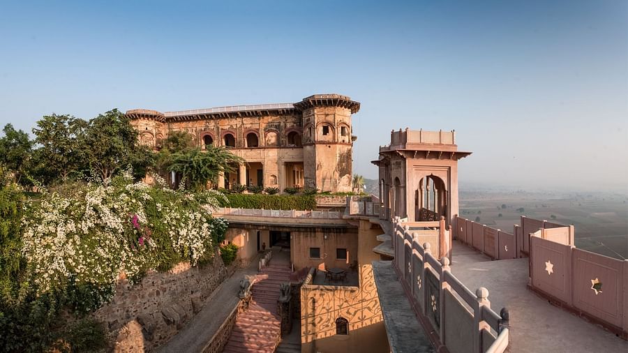 Facade shot of Tijara Fort-Palace - 19th Century, Alwar with clear blue sky in the background.