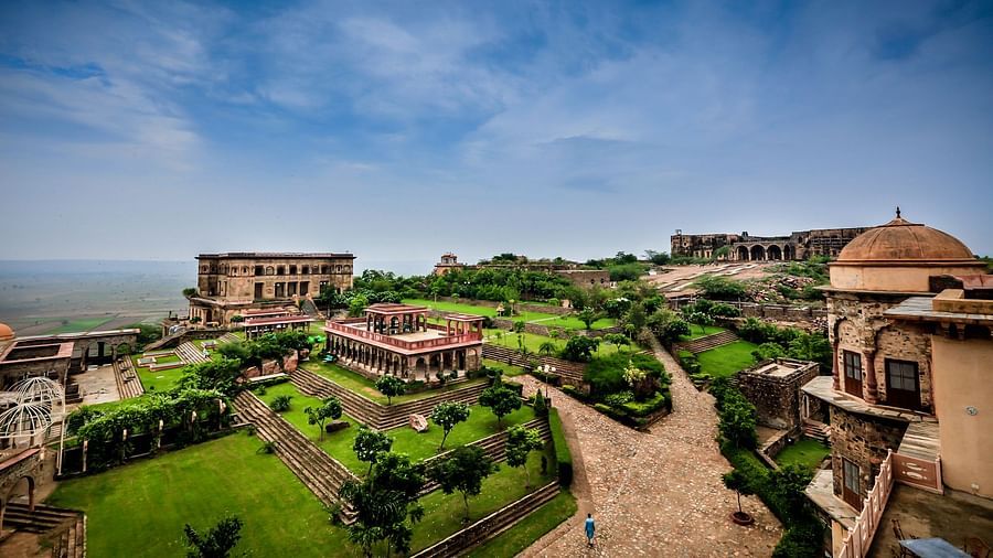 Facade shot of Tijara Fort-Palace - 19th Century, Alwar with clear blue sky in the background.