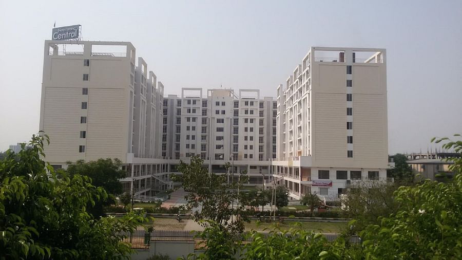 Facade view of Starlit Suites, Neemrana with trees in front of it