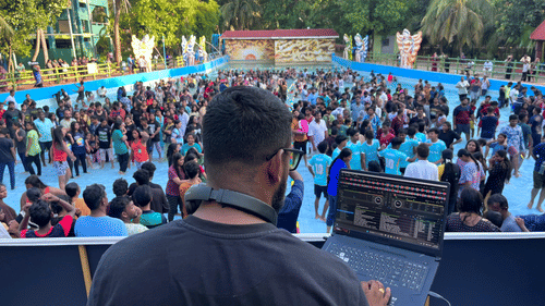 Crowd enjoying a live DJ event in the wave pool at Black Thunder Water Theme Park, a top adventure destination.