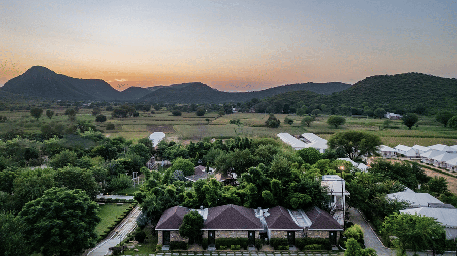 Aerial view of Valley by Grassfield set in greenery below the Aravalli hills, a destination wedding resort in Jaipur.