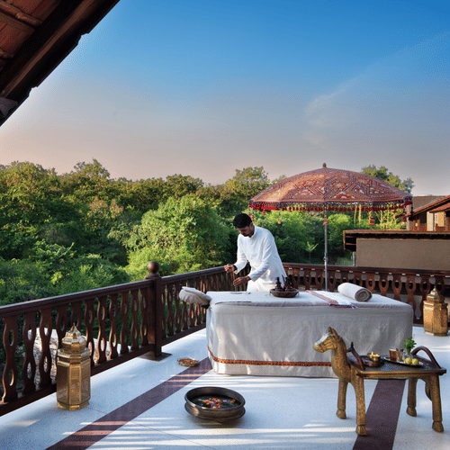 Man arranging Spa at the terrace of the lodge