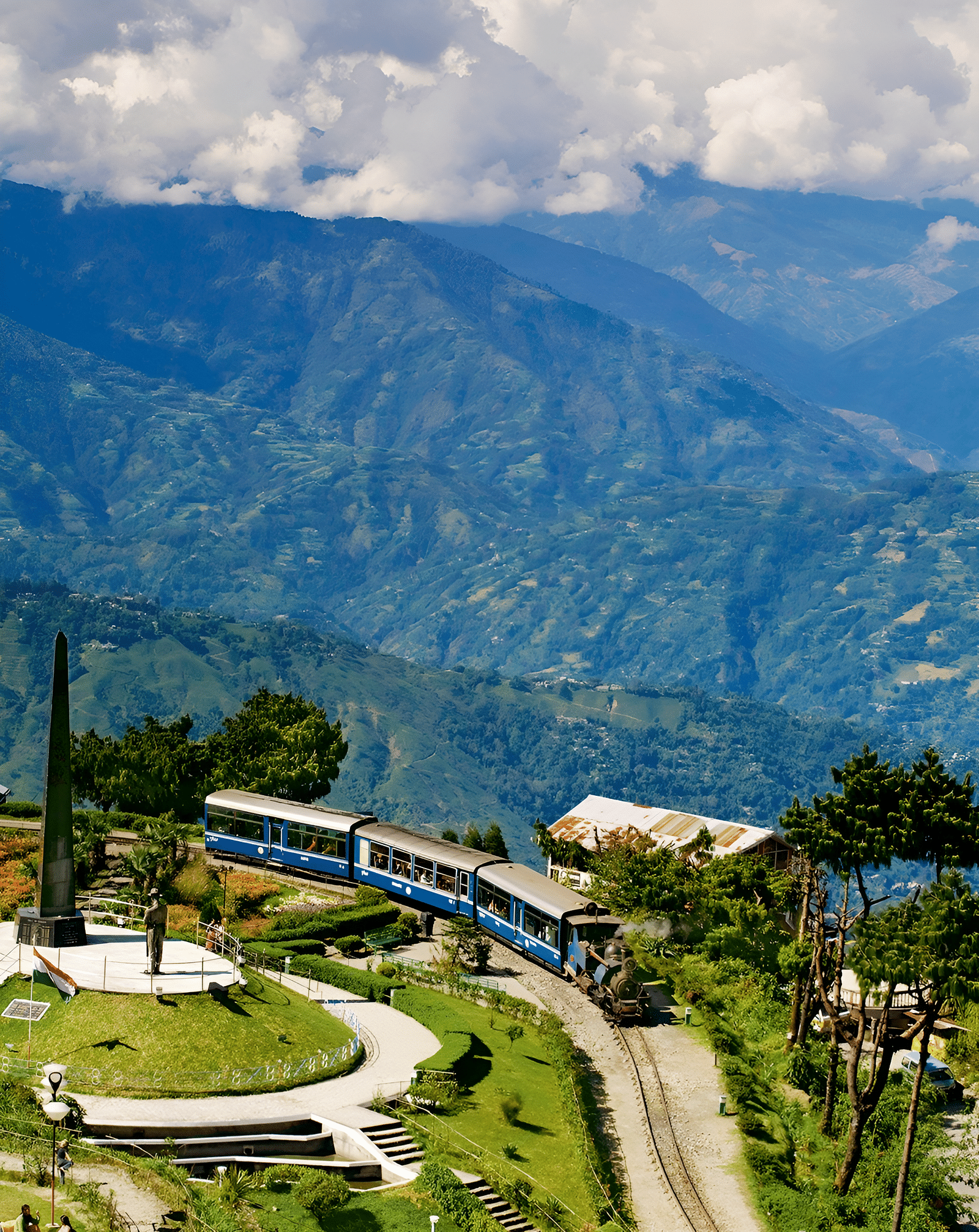 The Batasia Loop is a spiral railway track in Darjeeling which has a stunning backdrop of lush green hills.