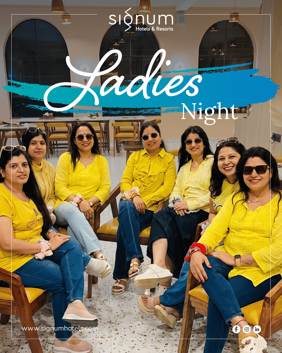 A group of women guests dressed in yellow for a ladies' night at the resort