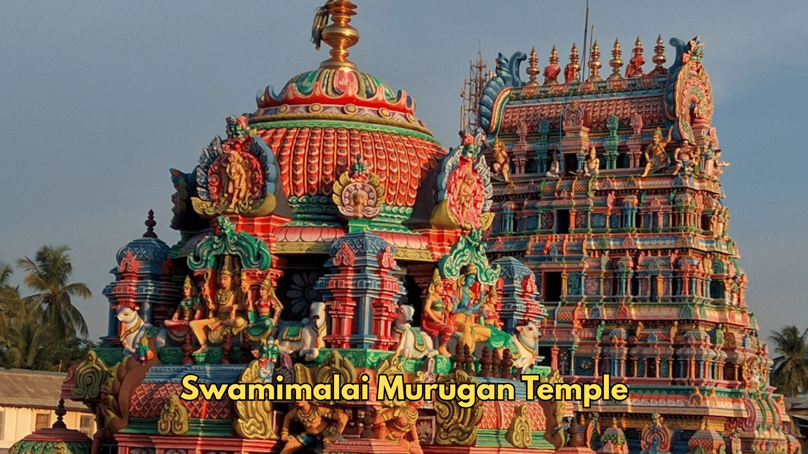 Domes and towers comprise the structure of Swamimalai Murugan Temple. Figures and patterns cover the surfaces.