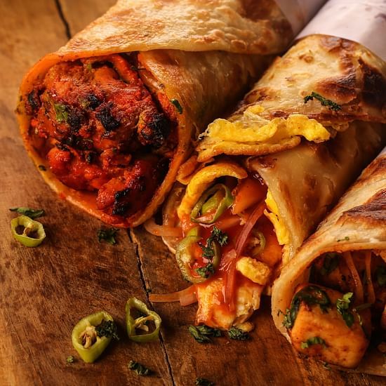 three rolls wrapped and kept on a table - polo floatel kolkata