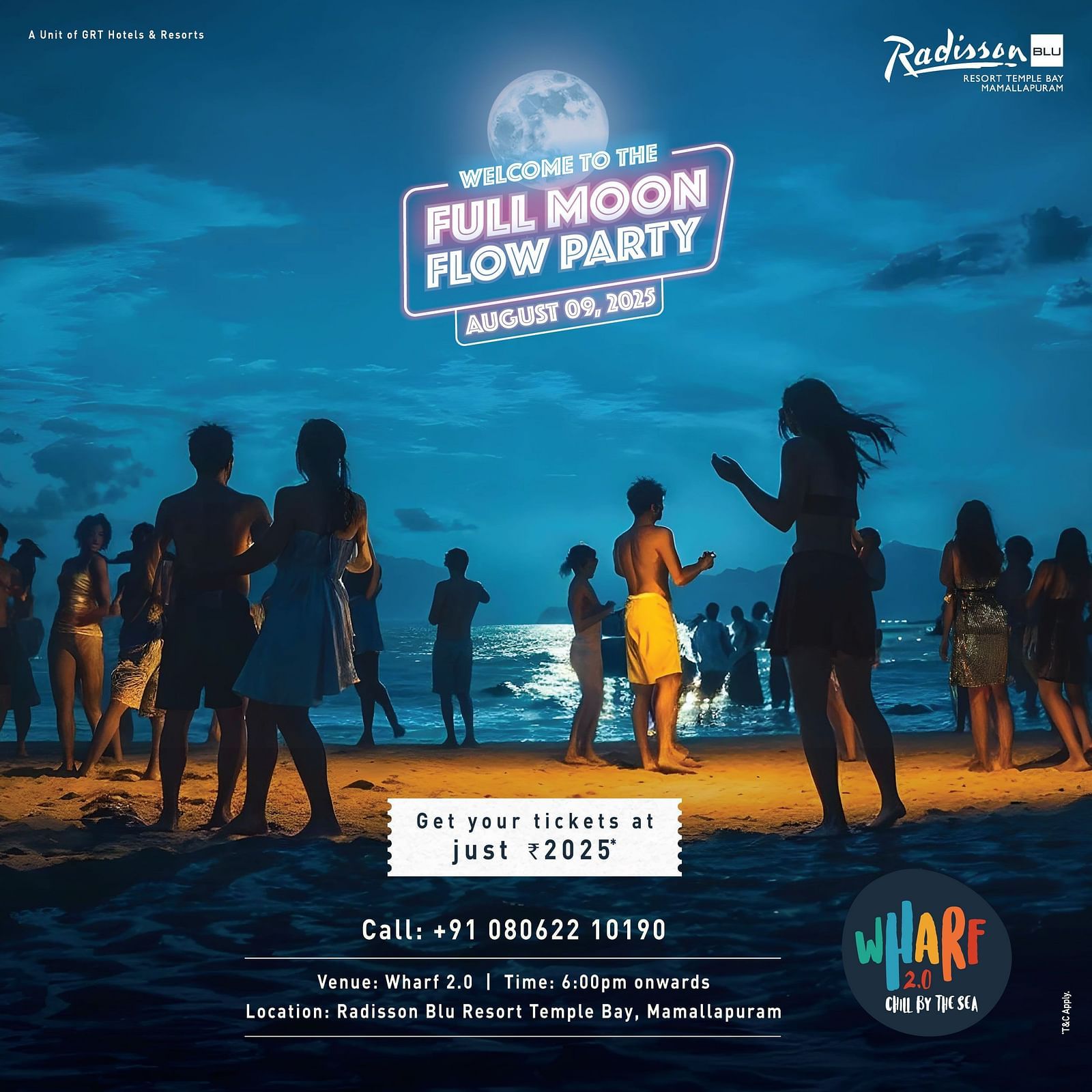 People dancing on the beach under a full moon at Radisson Blu Temple Bay’s Full Moon Flow Party, hosted at Wharf 2.0 with music and sea vibes.