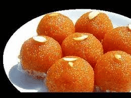 Motichoor laddoos on a white plate