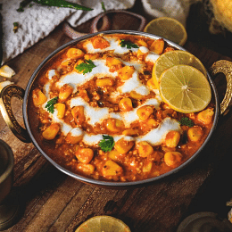 A bowl of curry with a creamy swirl on top. - - Bamboo Saa Resort & Spa, Udaipur