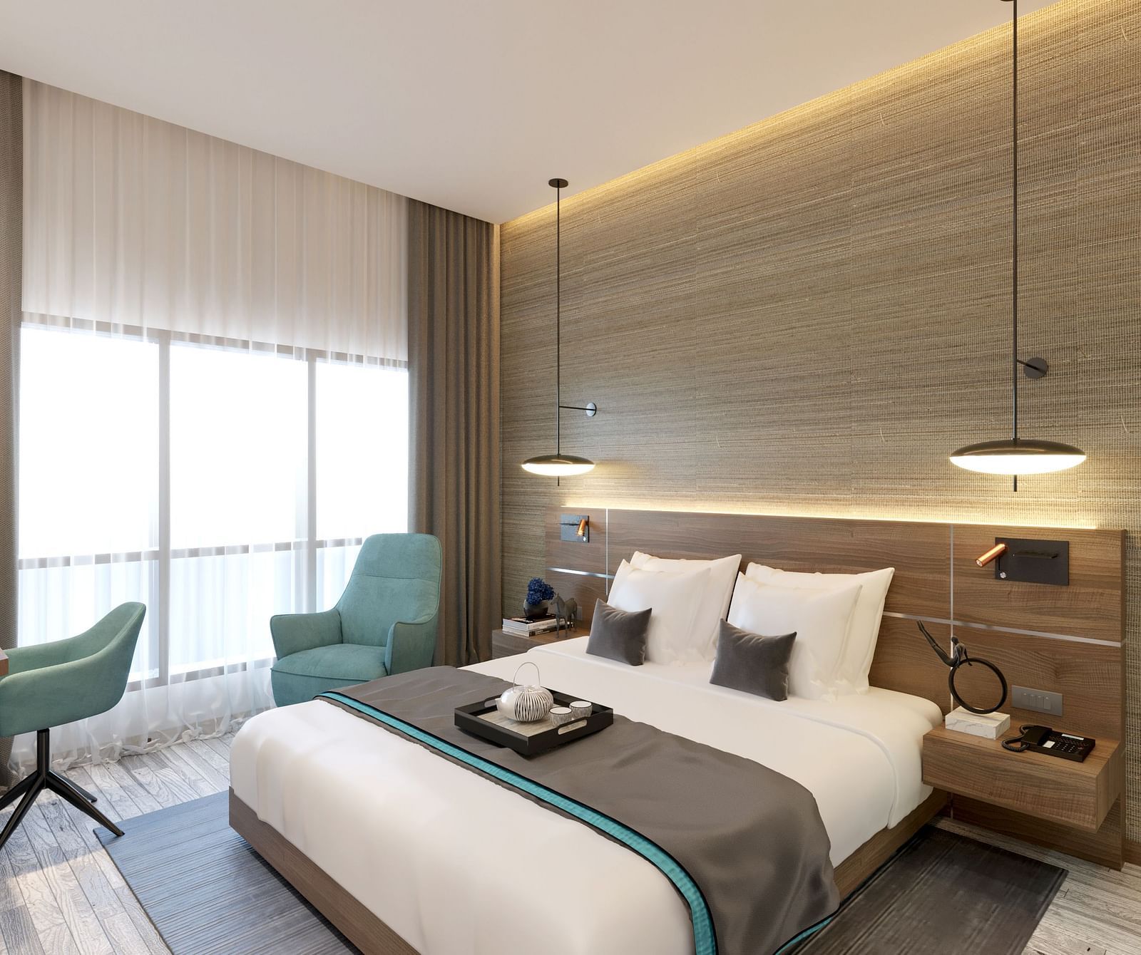 One Bedroom Suite in Kinshasa at Kertel Suites featuring a plush double bed with an arm chair besides it