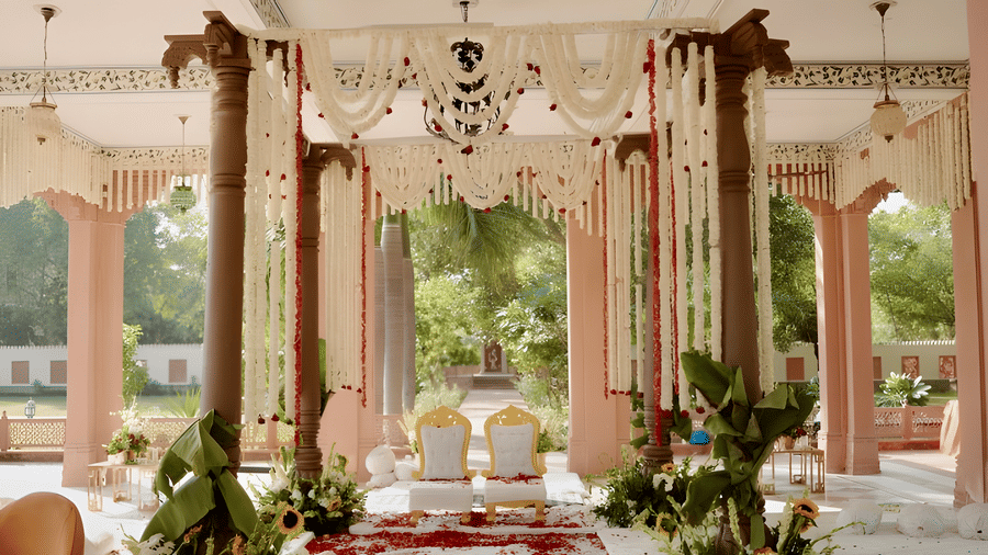 Floral mandap decor with pillars at Umaid Palace set for Charvi & Dhruv wedding ceremony.