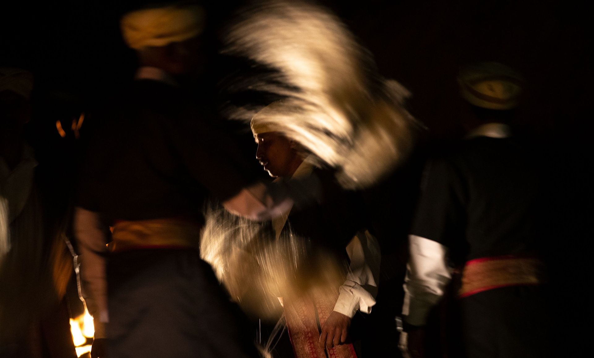 Motion blur photo of a Kodava dancer.