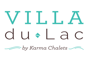 Logo of Villa du Lac by Karma Chalets in teal and brown text with a decorative line below.