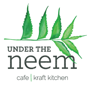 Logo of Under the Neem café and kraft kitchen located at Karma Chalets
