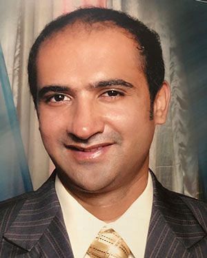 A portrait image of Mr. Sheeban Nizam, a hotel team member.
