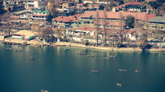 An image of a lake where many boats are floating