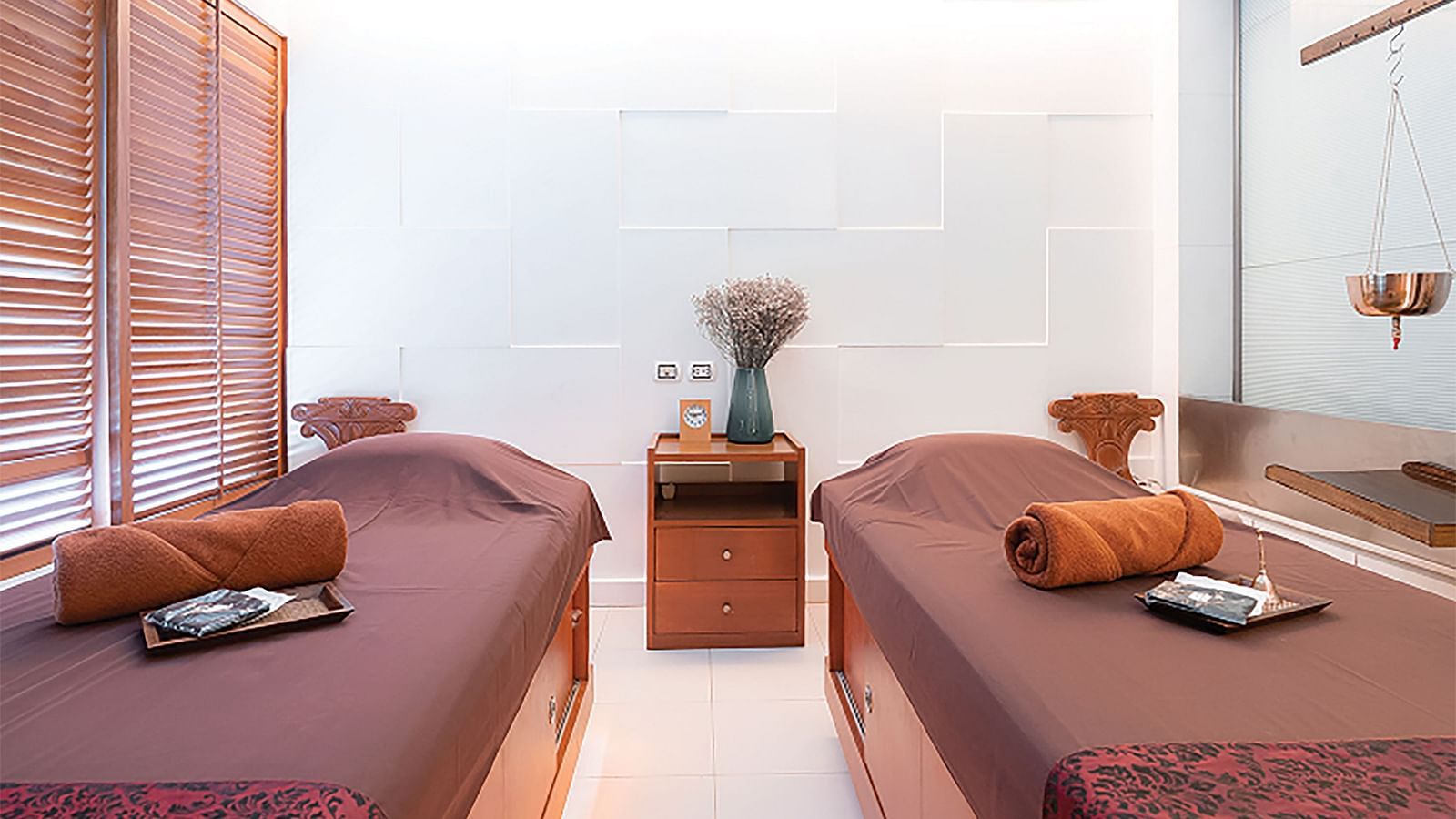 Two Spa beds in view at Coran Boutique Spa - Night Hotel Bangkok.