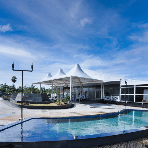 an event space with a swimming pool outside the event venue - MGM Hotels and Resorts