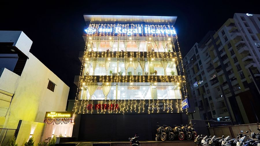 Facade image of Hotel Regal Heaven, Pune at night.