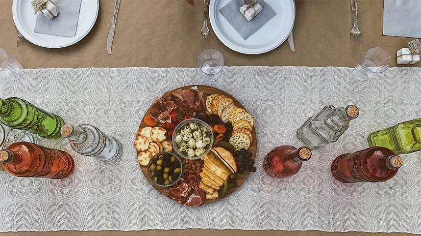 Lime Tree Hotel Golf Course Extension Road Gurgaon - Food on the table with cutlery and water bottels