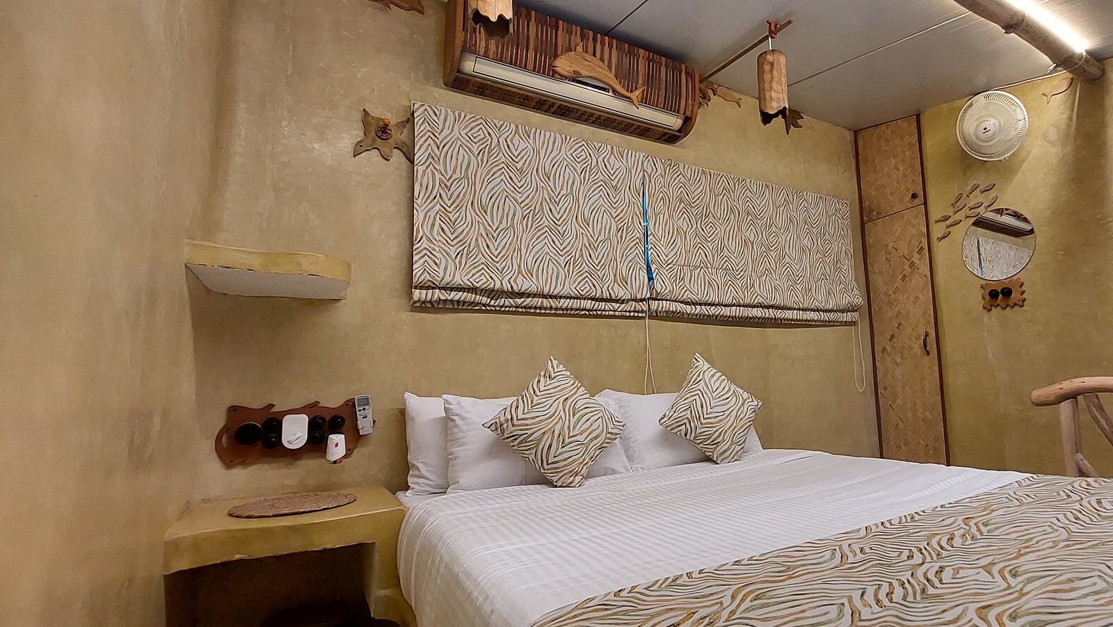 Bed with bedding in the room | Matsya Island Retreat