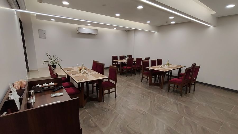 Alternate view of dining area with clean, modern décor