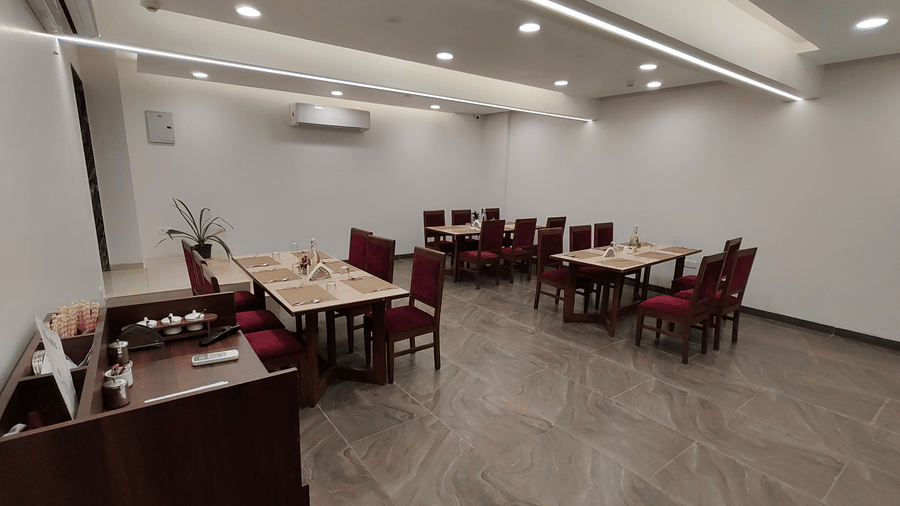 Alternate view of dining area with clean, modern décor