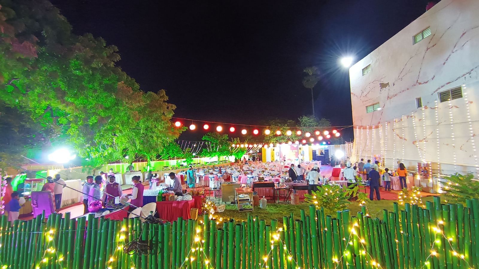 A view of an event in Tuticorin held at the Starlight Garden, with fences adorned with bright lights - Regency Tuticorin by GRT Hotels